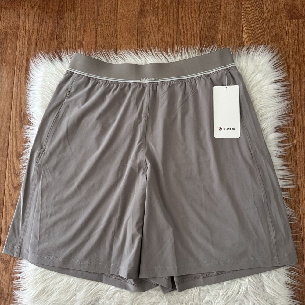 Lululemon Swift Relaxed Shorts 9” Logo Waistband Women’s XL Warm Ash Grey NWT